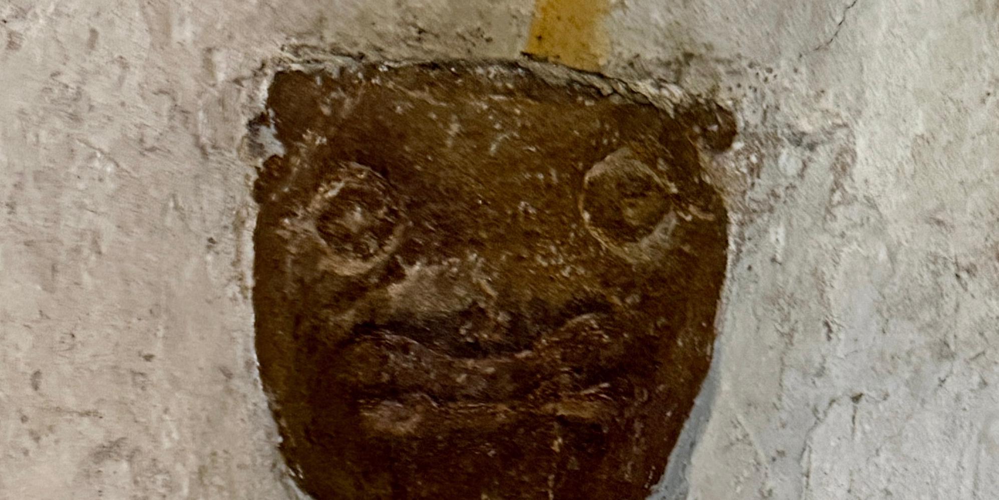 Fratzenkopf in der Alten Kirche